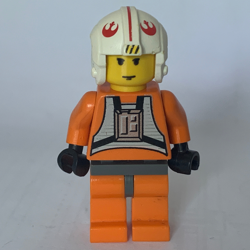 LEGO Luke Skywalker, Orange Rebel Pilot Outfit, Yellow Skin, Dark Bluish Gray Hips (3626b Head) (fig-003527)
