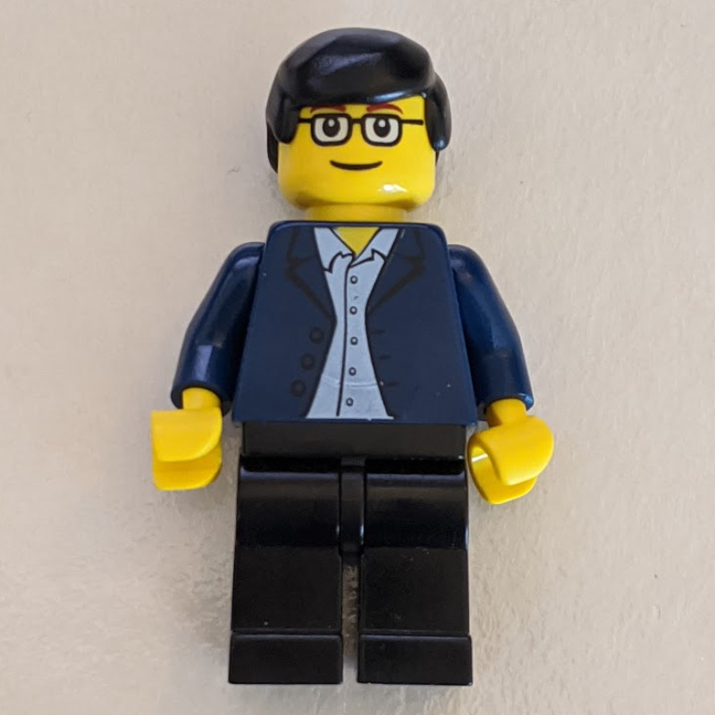 LEGO Man - Dark Blue Jacket, Black Legs, Glasses (fig-004781)