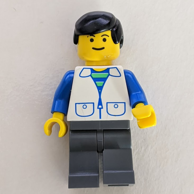 LEGO Man - White Jacket, Dark Gray Legs (fig-004912)