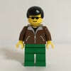 Man - Brown Jacket, Green Legs
