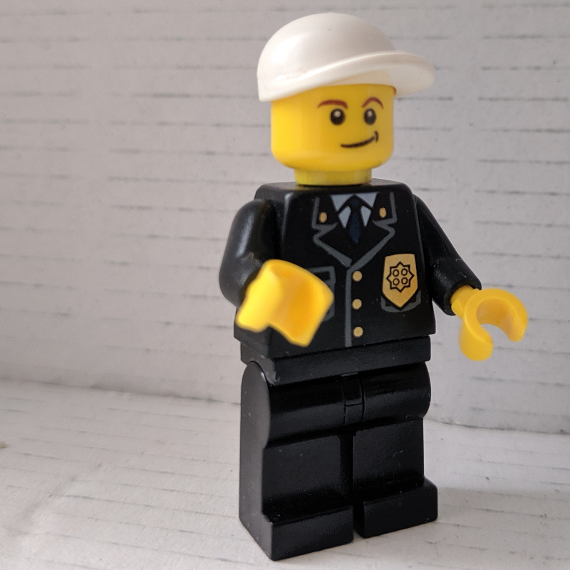 LEGO Policeman, Black Suit with Badge, White Cap (fig-007799)
