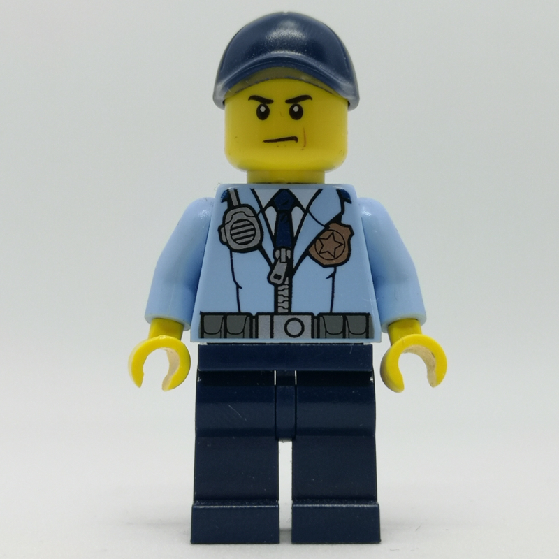 LEGO Policeman, Bright Light Blue Jacket with Zipper, Radio, Badge, and Tie, Dark Blue Legs, Dark Blue Cap (fig-007907)