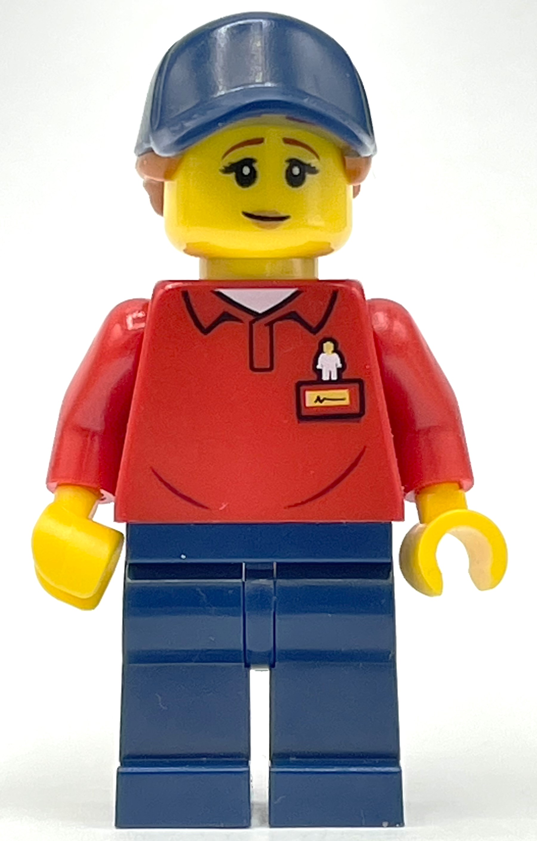 LEGO LEGOLAND Employee, Red Torso, Dark Blue Legs, Dark Blue Cap, Reddish Brown Hair (fig-008447)