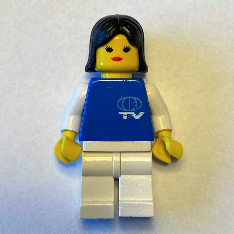LEGO Woman, Blue Top with TV Logo, White Legs, Black Hair (fig-008719)