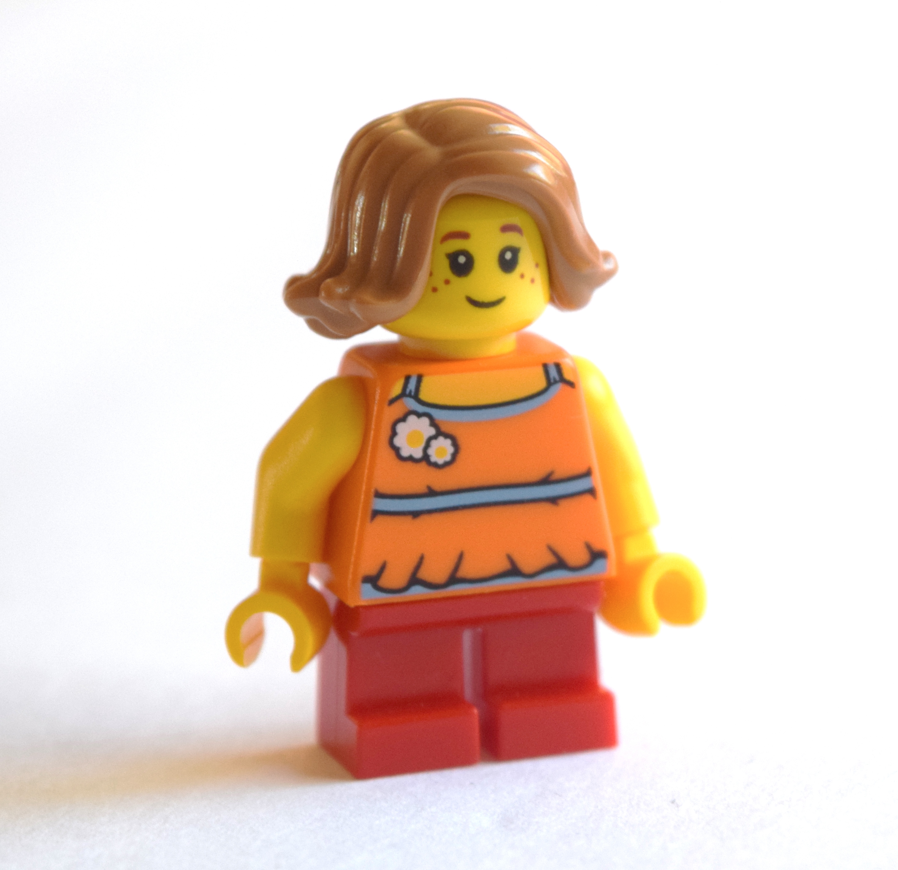 LEGO Girl, Orange Top, Short Red Legs, Medium Nougat (fig-009307)