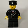 Pilot, Black Suit with Tie and Airplane Badge, Black Hat, Brown Eyebrows