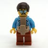 Man, Open Dark Azure Hawaiian Shirt, Dark Orange Legs, Dark Brown Hair, Baby Carrier