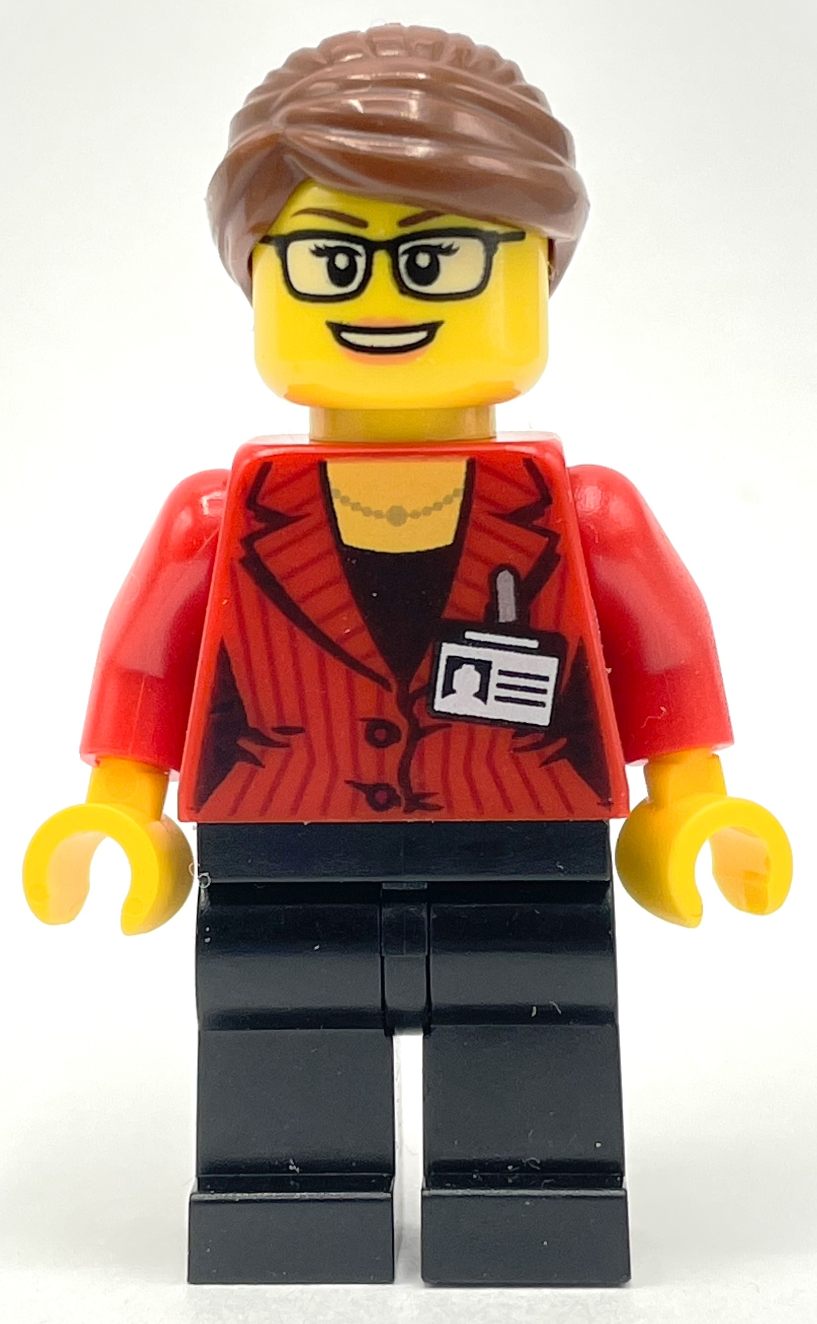 LEGO Woman, Red Jacket, Black Legs, Reddish Brown Hair, Clear Badge (fig-009864)