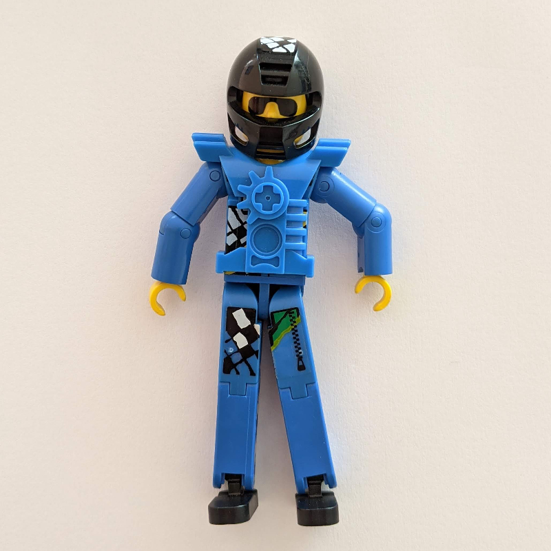 LEGO Technic Figure Blue Legs, Blue Top with Technic Logo, Black Hair and Sunglasses - Black Helmet (fig-010496)